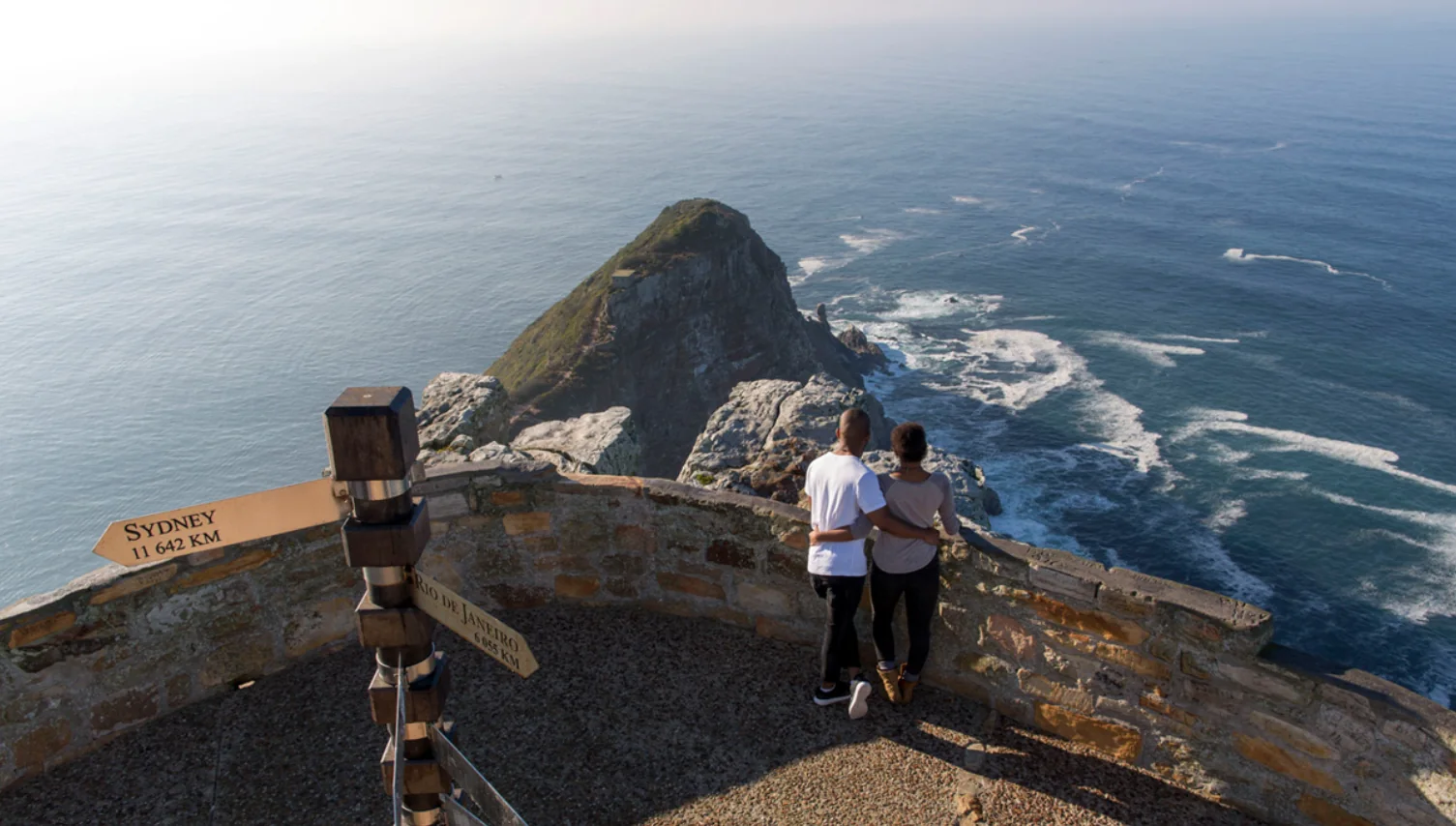 Private Cape Peninsula Tour — Cape Point cliffs and Atlantic Ocean at sunset — Wanderer Tours and Travel