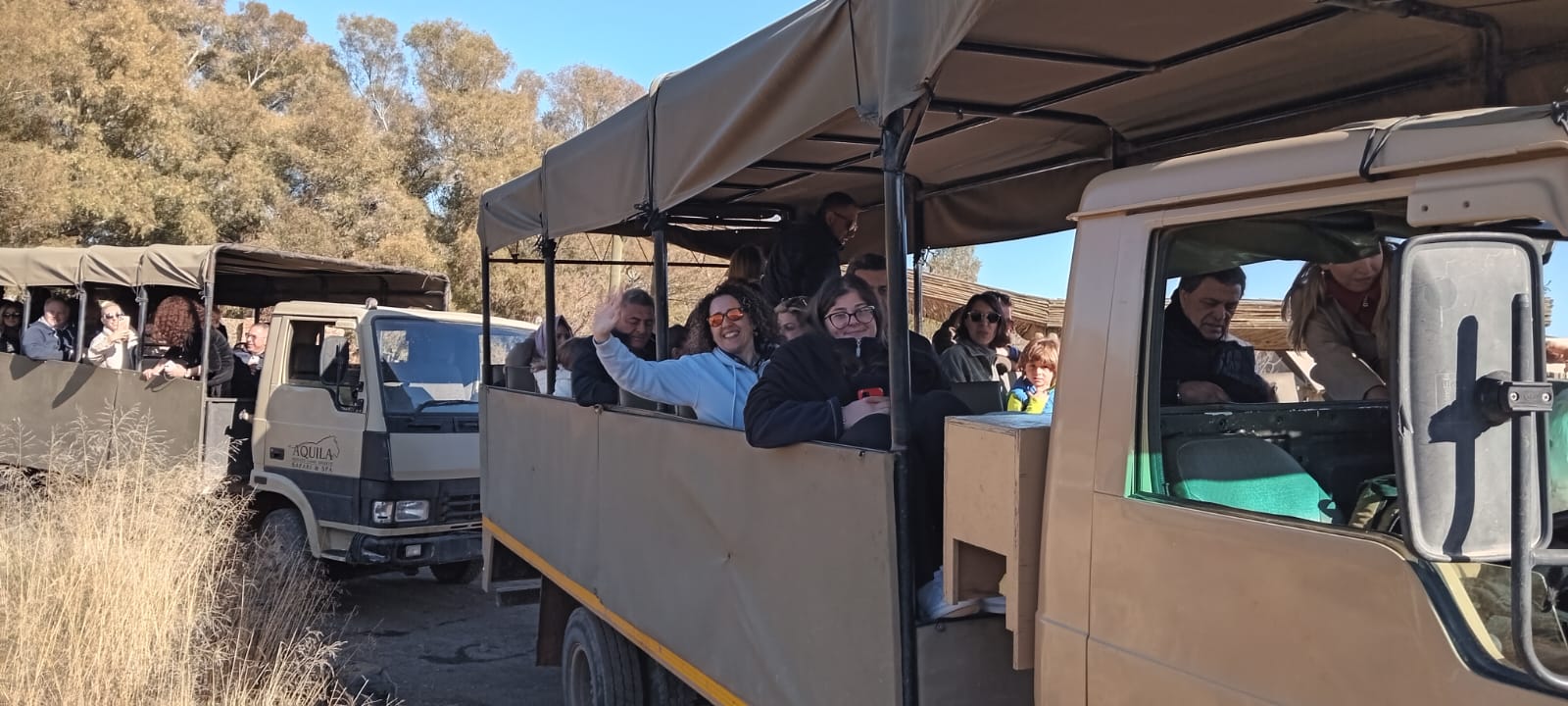 Day safari from Cape Town — guests on Aquila Private Game Reserve open 4x4 game drive vehicles