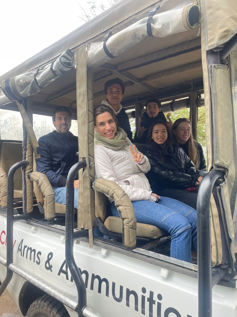Family day safari from Cape Town — parents and children on an Aquila 4x4 game drive vehicle