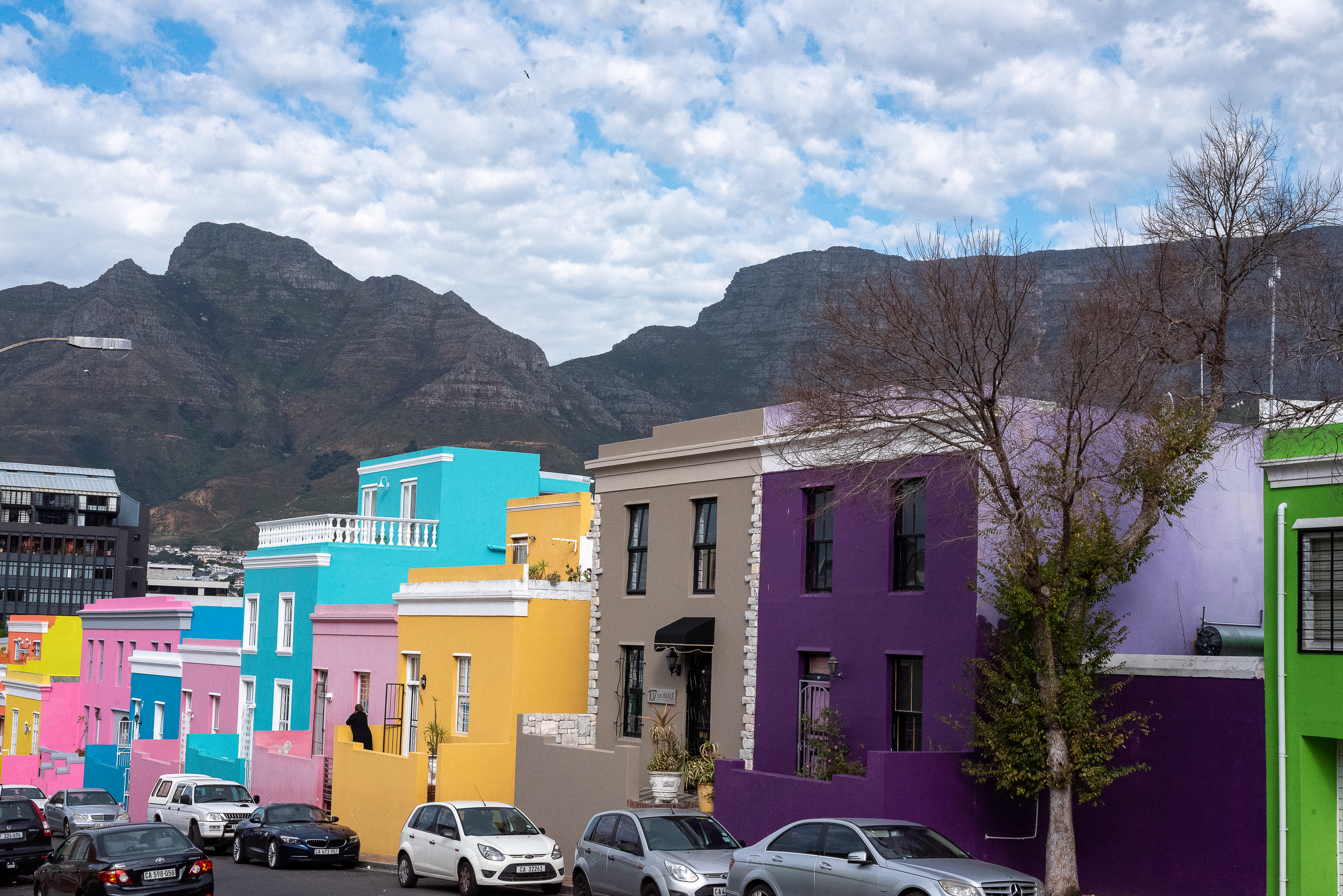 Brightly painted historic houses on a cobbled street in the Bo-Kaap, Cape Town